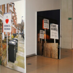 Subverted Estate Agent Boards "I love Council Houses" and "Estate Agents: Everyone Hates You"